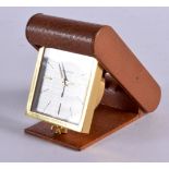 A VINTAGE JAEGER LE COULTRE TRAVELLING LEATHER CASED CLOCK. 6 cm x 9 cm.