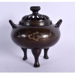 A 19TH CENTURY JAPANESE MEIJI PERIOD TWIN HANDLED BRONZE CENSER AND COVER decorated in mixed metals