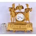 A LARGE EARLY 19TH CENTURY FRENCH GILT BRONZE EMPIRE MANTEL CLOCK formed as a figure and a female pl