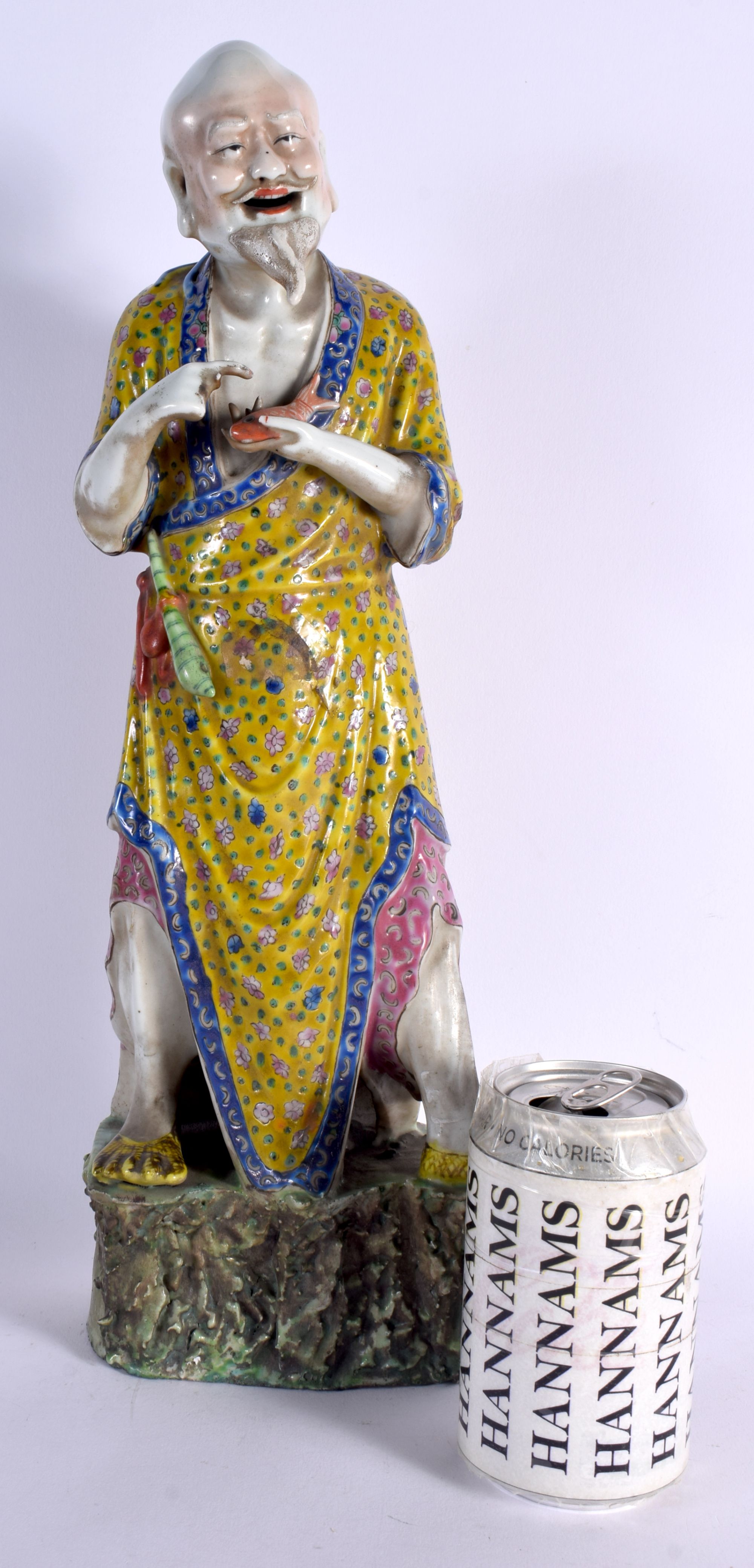 A LARGE CHINESE REPUBLICAN PERIOD PORCELAIN FIGURE OF A FISHERMAN modelled holding a fish. 42.5 cm h