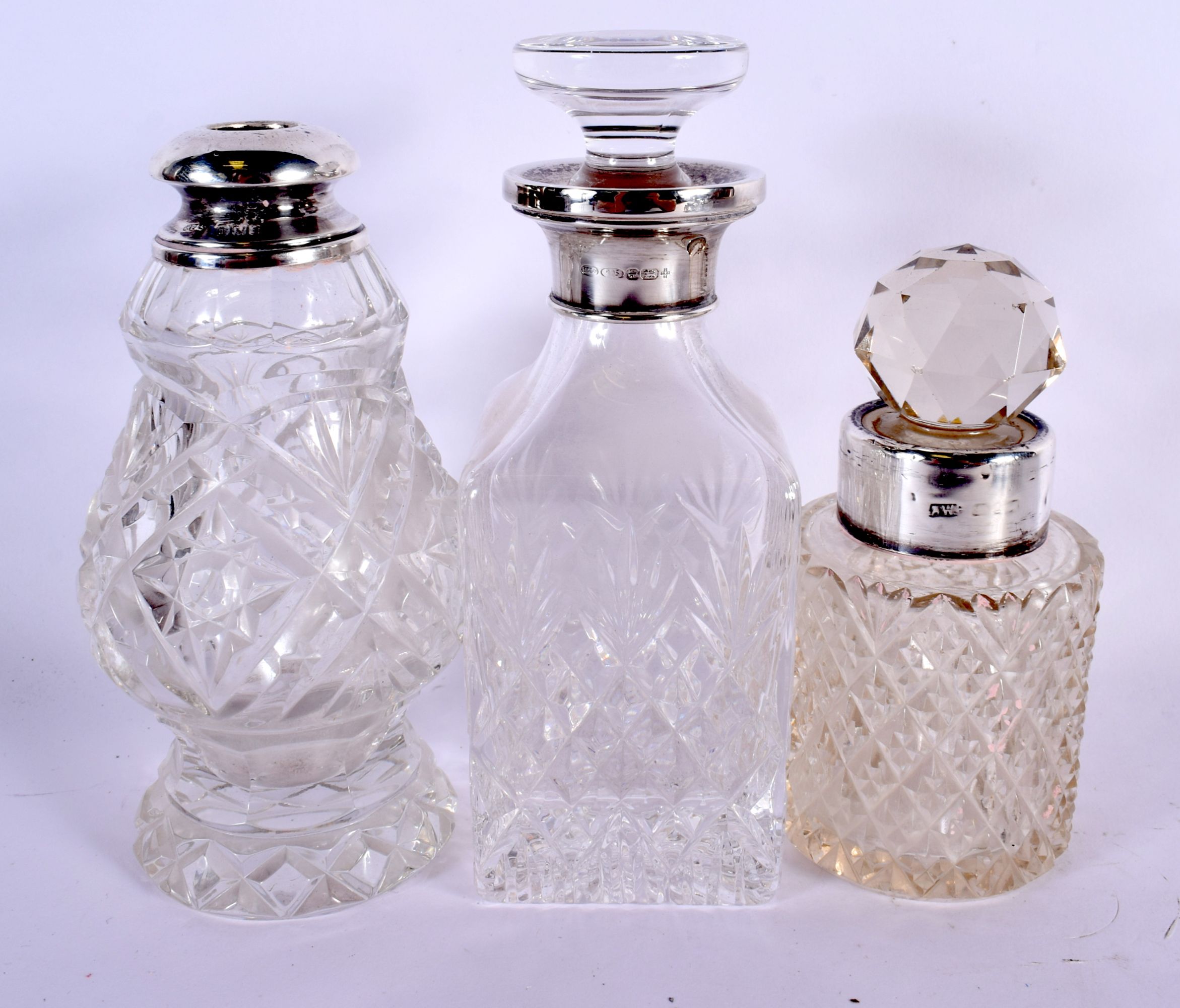 A COLLECTION OF MAINLY ANTIQUE SILVER MOUNTED SCENT BOTTLES in various forms and sizes. Birmingham 1 - Image 6 of 12