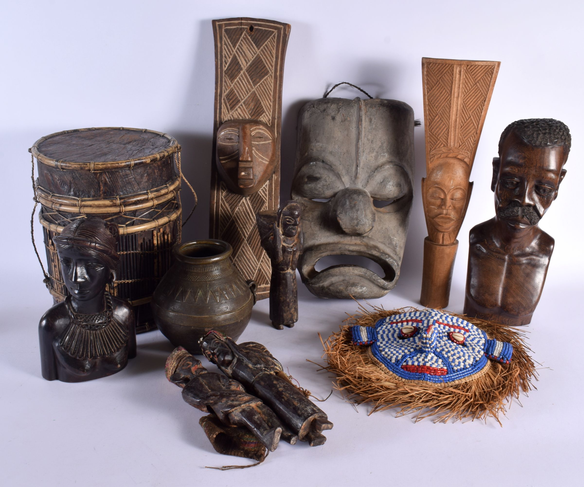 A COLLECTION OF VINTAGE AFRICAN TRIBAL ARTEFACTS. (qty)