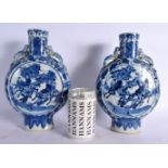 A PAIR OF MID 19TH CENTURY CHINESE BLUE AND WHITE PORCELAIN PILGRIM FLASKS Qing, painted with figure