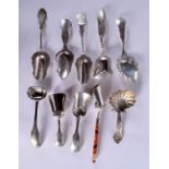 A COLLECTION OF TEN ANTIQUE SILVER CADDY SPOONS. 116 grams. Largest 13 cm long. (10)