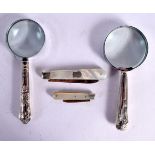 TWO SILVER MAGNIFYING GLASSES together with two silver bladed fruit knives. Sheffield 1905, 1988, 18