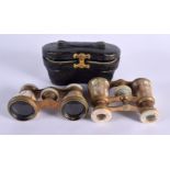 TWO PAIRS OF ANTIQUE MOTHER OF OPERA GLASSES. 9.5 cm x 6.5 cm extended. (2)