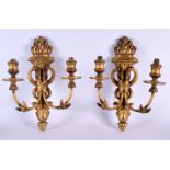 A PAIR OF EARLY 20TH CENTURY COUNTRY HOUSE GILTWOOD TWIN BRANCH CANDLE WALL SCONCES. 38 cm x 20 cm.