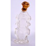 AN ANTIQUE GOLD CRYSTAL GLASS SCENT BOTTLE. 11.5 cm high.