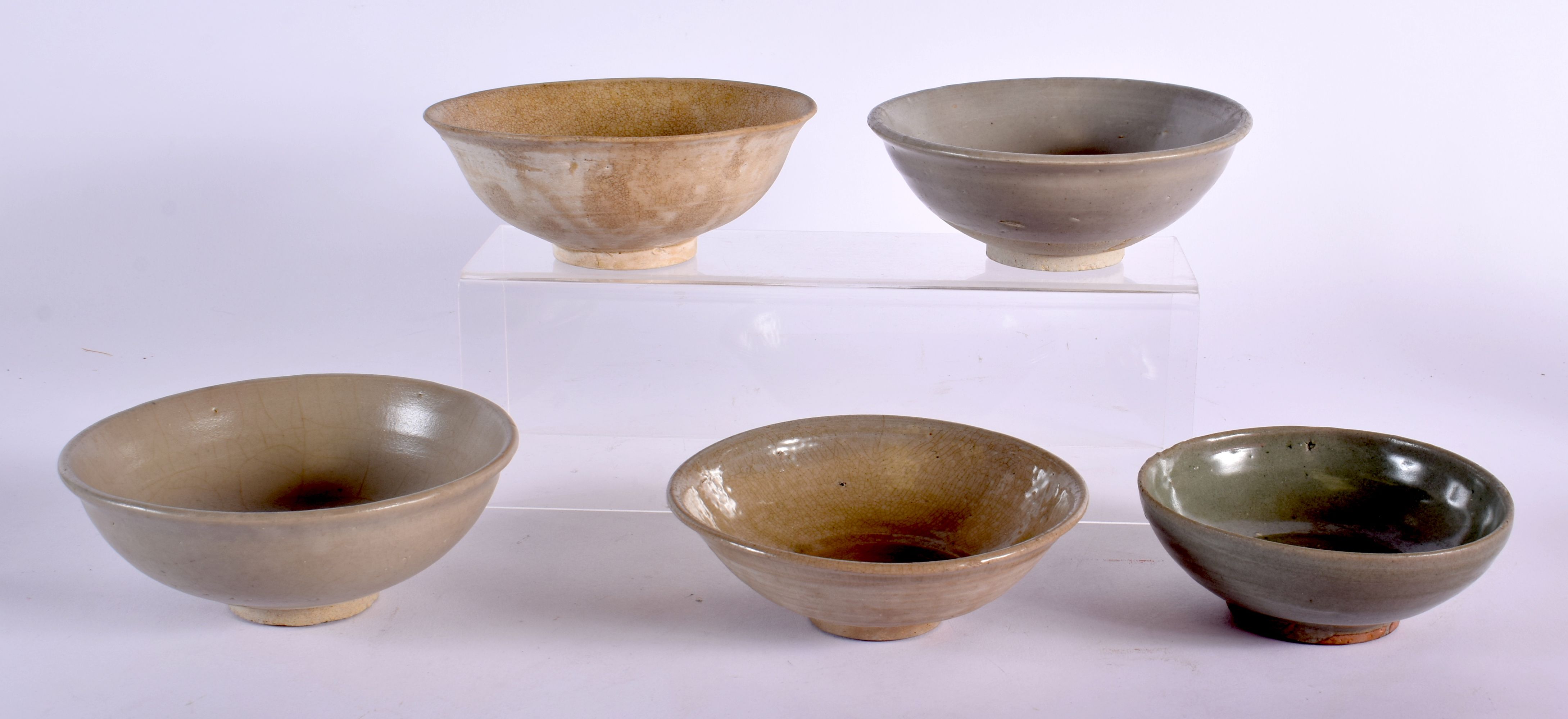 A COLLECTION OF EARLY CHINESE SUNG STYLE CHINESE CELADON BOWLS in various forms and sizes. 16 cm dia