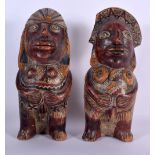 A PAIR OF 19TH CENTURY SOUTH AMERICAN POTTERY FIGURES modelled as a nude male and female. 21 cm high
