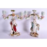A PAIR OF 19TH CENTURY GERMAN DRESDEN PORCELAIN TWO BRANCH PORCELAIN CANDLESTICKS bearing pseudo Mei