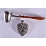 AN EDWARDIAN SILVER HEART SCENT BOTTLE together with a modern silver candle snuffer. Birmingham 1905