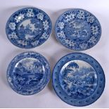 FOUR 19TH CENTURY ENGLISH BLUE AND WHITE POTTERY PLATES decorated with birds amongst foliage. Larges