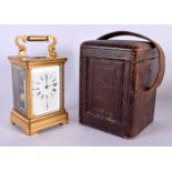 AN ANTIQUE FRENCH CASED REPEATING CARRIAGE CLOCK with subsidiary dial. 18.5 cm high inc handle.