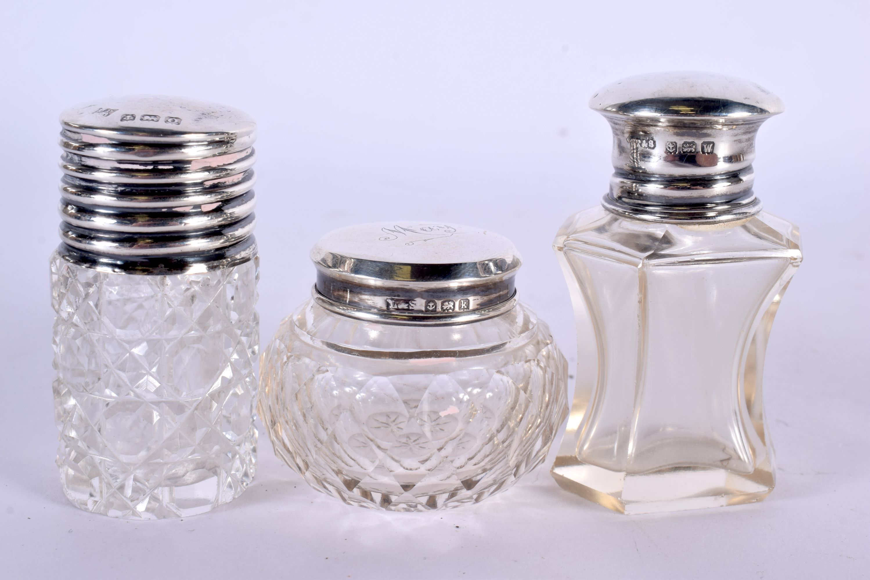 A COLLECTION OF MAINLY ANTIQUE SILVER MOUNTED SCENT BOTTLES in various forms and sizes. Birmingham 1 - Image 12 of 12