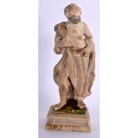 A 17TH/18TH CENTURY EUROPEAN CARVED ALABASTER FIGURE OF A SAINT modelled upon a square plinth. 15.5