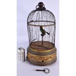 A LARGE ANTIQUE AUTOMATON SINGING BIRD CAGE with gilded repousse mounts. 52 cm x 20 cm.