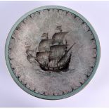 AN EARLY 20TH CENTURY EUROPEAN PORCELAIN CIRCULAR DISH painted with a ship under a pale blue border.