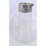 A STERLING SILVER AND CUT GLASS JUG. 26 cm x 12 cm.
