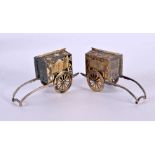 A PAIR OF JAPANESE TAISHO PERIOD SILVER MIXED METAL RICKSHAW CONDIMENTS. 45 grams. 6.5 cm x 3.75 cm.