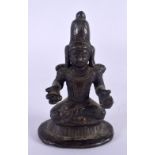 AN 18TH CENTURY INDIAN BRONZE FIGURE OF A SEATED DEITY modelled with both hands outstretched. 11 cm