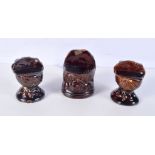 A collection of early 19th Century Staffordshire treacle glazed sash window stops ,one in the form