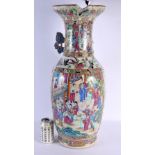 A LARGE 19TH CENTURY CHINESE CANTON FAMILLE ROSE PORCELAIN VASE painted with figures in interiors. 6