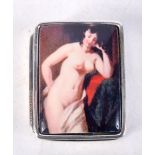 A CONTINENTAL SILVER PILL BOX DECORATED WITH A NUDE FEMALE. Stamped 925, 1.3cm x 2.6cm x 3.2cm, wei