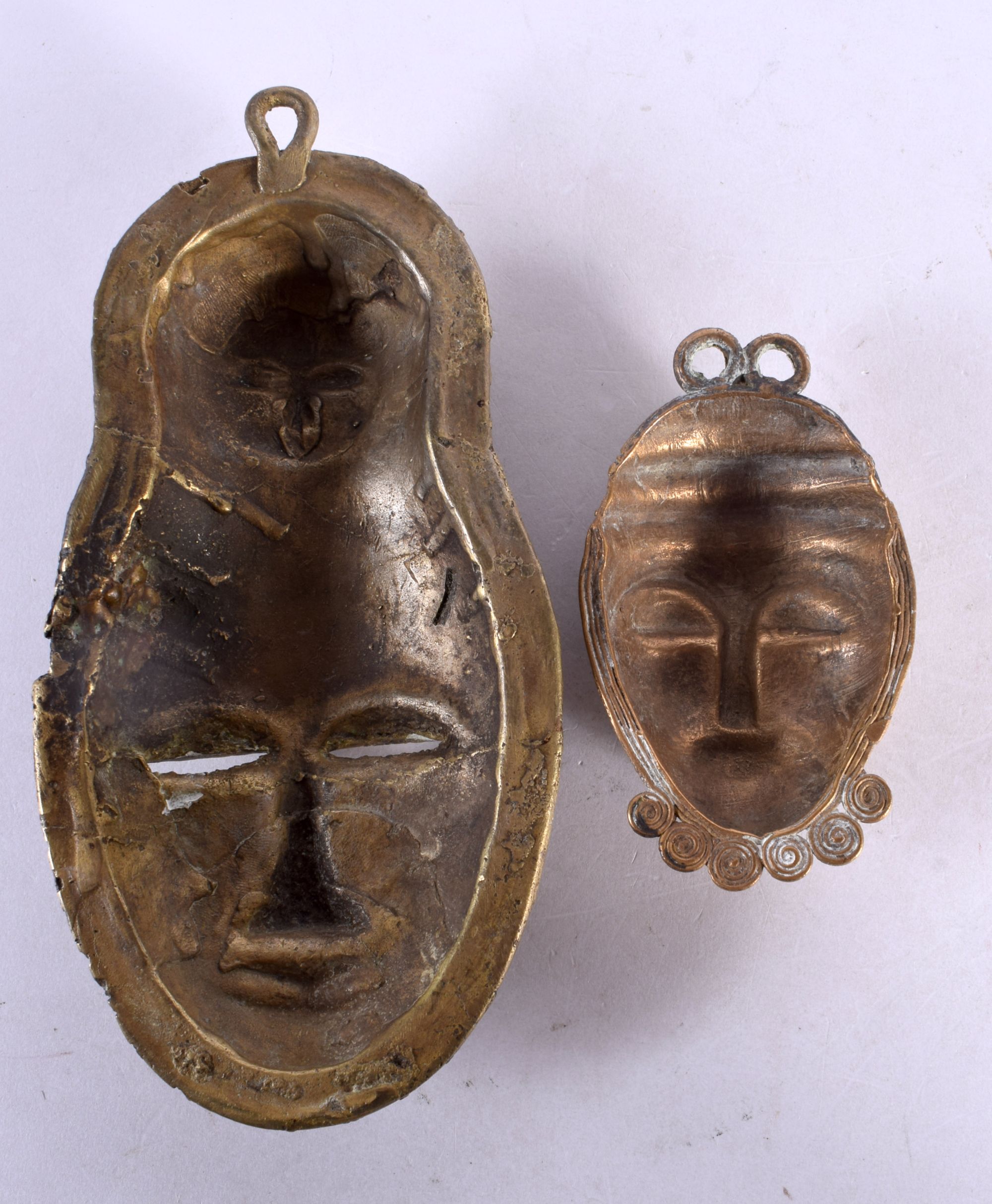 TWO TRIBAL BRONZE MASKS. 21 cm x 10.5 cm. (2) - Image 2 of 2