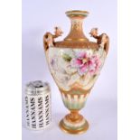 Royal Worcester two-handled pedestal vase, the ogee shaped moulded body painted with a clematis, on