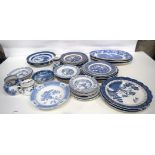 A large collection of blue and white ceramics plates ,jugs etc (Qty).
