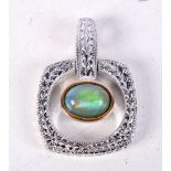 A WHITE METAL AND OPAL PENDANT. 2.8cm x 1.9cm. Weight 8.1g
