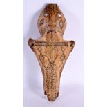 A RARE 19TH CENTURY CONTINENTAL TRIBAL CARVED AND ENGRAVED HORSE SKULL decorated with animals and mo