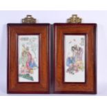 A PAIR OF CHINESE FAMILLE ROSE PORCELAIN AND HARDWOOD PLAQUES 20th Century. 25 cm x 15 cm.