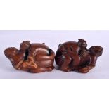 A CHARMING PAIR OF JAPANESE CARVED BOXWOOD EROTIC NETSUKES modelled with figures romping. 7 cm x 3 c