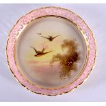 Graingers Worcester circular dish with pierced sides painted with swallows above a raised gilt tree