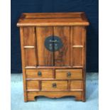 A small wooden Korean three drawer chest 80 x 60 x 30 cm