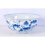 A Chinese porcelain petal edged blue and white bowl decorated with fish, algae and Lotus 10 x 23 cm