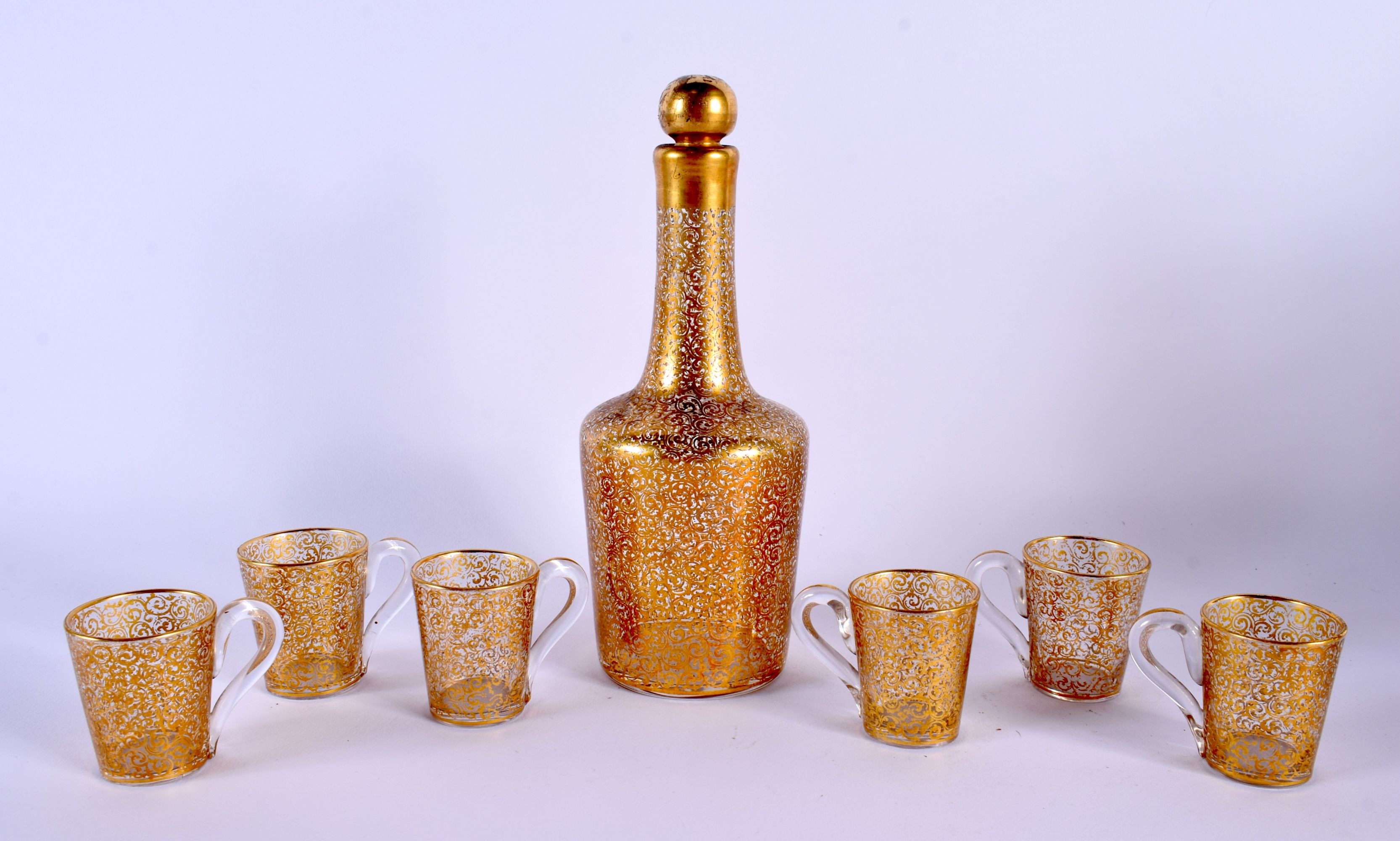 A FINE ANTIQUE BOHEMIAN GILT DECORATED GLASS LIQUOR BOTTLE with stand and glasses. Largest 27 cm x 1 - Bild 4 aus 17