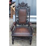 AN ANTIQUE LEATHER UPHOLSTERED CHAIR. 140 cm x 52 cm.