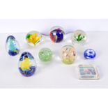 A collection of paperweights including Millefiori and a vintage St Andrews golf course weights large