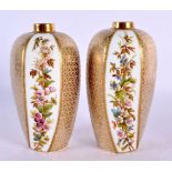 19th century Coalport rare pair of vases painted with an alternating panel of flowers and raised gil