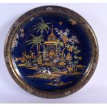 A VERY RARE CARLTON WARE CIRCULAR BLUE GLAZED PORCELAIN BOWL unusually painted with mosques and East