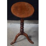 An Oval Georgian tilt top wine table 70 x 53 x 39 cm.