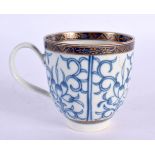 18th century Worcester coffee cup painted with an early version of the Royal Lily pattern. 6cm High