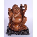 A 19TH CENTURY CHINESE HARDWOOD FIGURE OF A BUDDHA Qing. 20 cm x 12 cm.