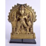 A 17TH/18TH CENTURY INDIAN BRONZE BUDDHISTIC VOTIVE PANEL depicting a figure behind a flaming back d