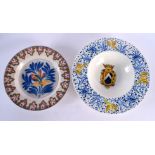 AN ANTIQUE FAIENCE DELFT TYPE DISH together a faience armorial dish. Largest 22 cm diameter. (2)