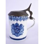 A RARE GERMAN MEISSEN COMMEMORATIVE TANKARD painted with armorials. 19 cm high.