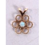 A SMALL 14CT GOLD AND OPAL PENDANT. 1 grams. 1.5 cm x 1.25 cm.